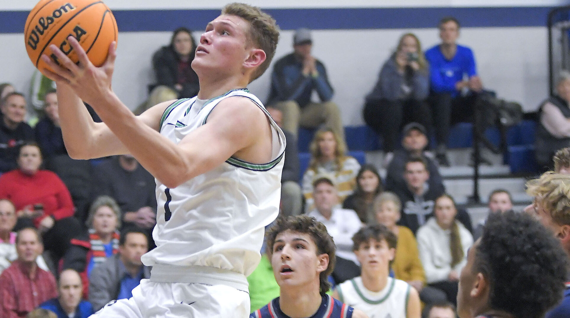 Prep hoops: Ridgeline boys fall at home to Woods Cross